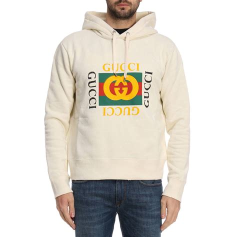 white gucci sweater.